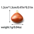 Detail view of orange shell charm measuring 1.2x1.3cm for DIY jewelry making - Scallop Shape (TP1393-02-red)