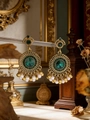 Detail of vintage gold earrings featuring green gemstones and white pearl tassels - Dark Green Round Cut Gemstone (WEH6346) / White Beads Green Rhinestone Antique Gold