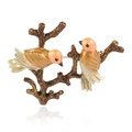 Detailed view of enamel magpie bird brooch with twin birds on a vintage branch base - White K-Coffee
