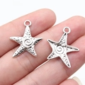 Pair of vintage silver swirl starfish charms for DIY jewelry making 23x20mm pendants - Antique Silver