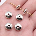Perles d'espacement argentées en alliage pour bijoux DIY montrées dans la main - Argent antique