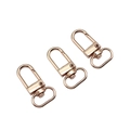 Three rose gold metal lobster clasps for bags and jewelry making on white background - 33x13mm / KC Gold