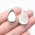 Silver teardrop alloy pendant base for DIY jewelry making showing front and back - Teardrop (B18137)