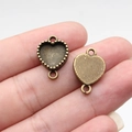 Antique bronze heart-shaped jewelry connector with textured bezel for DIY craft projects - Heart (A13890)