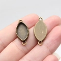 Oval antique bronze jewelry connectors with serrated bezel for DIY craft making - Marquise (A13891)