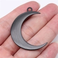 Gothic style matte black large moon pendant in hand for scale with top hanging loop - Moon Style (D11747) / Electrophoretic Black