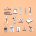 Set of 15 antique silver school themed metal pendants including bus and school bag - Antique Silver (L10306_W08-B06)