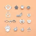 Set di 14 ciondoli e charm a forma di zampa di cane in argento antico per gioielli DIY - Argento Antico