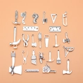 25-piece silver alloy DIY tool charms set with hammers and wrenches on orange background - Antique Silver