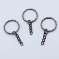 Three gunmetal black 30mm embossed textured keyrings with short 4-link chains - Gunmetal