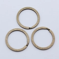 Flache runde Schlüsselringe aus Bronzelegierung für DIY-Schmuck und Bastelzubehör - 25mm / Antikbronze