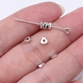 4x4mm vintage geometric zinc alloy spacer beads for DIY jewelry making shown on hand - Antique Silver