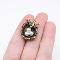 Antique bronze bird nest pendant with swallow and three white pearls for DIY jewelry - Antique Bronze