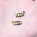 Vintage bronze dollar bill pendant charm showing 100 and dollar symbol for DIY jewelry making - Antique Bronze