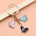 Handmade butterfly keychain with pink, blue and black enamel charms in rose gold finish - Colorful Butterfly Style (XY30060)