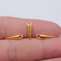 Gold cone pendant charm with top loop for DIY jewelry making shown on fingertip - Bright Gold
