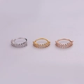 Macro view of micro-pave zircon hoop earrings in silver, gold, and rose gold finishes - Silver / Style 1