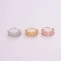 Detailed view of copper cartilage rings in silver gold and rose gold with zircon leaves - Style 5