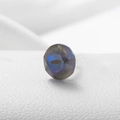 Dunkelblauer irisierender Zirkonia im Rundschliff für DIY-Schmuck auf weißer Textur - 6.2MM / Dunkelblau/Mocha (32#)