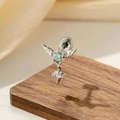 Silver angel wing cross stud earring with light blue star gemstone on a wooden stand - Light Sea Blue (1 Pc)