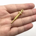 Golden metal syringe charm pendant with realistic scale markings for jewelry making - Bright Gold