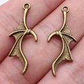 Vintage bronze devil bat wing charms for DIY jewelry making featuring textured metal finish - Antique Bronze