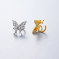 Macro shot of silver zircon butterfly stud and golden filigree ear cartilage jewelry - Silver White Zirconia Ear Clip (Single)