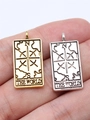 Silver Tarot The World pendant on fingertip showing 26x13mm size and vintage details - The World / Antique Gold