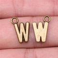 Bronze letter W pendant charm set with vintage brushed metal texture on skin for scale - Capital Letter W (A13230)