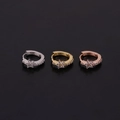 Detailed view of three mini huggie hoop earrings in silver, gold, and rose gold with zircon - Six-Petal Flower Style (HS251)