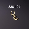 Single golden moon drop earring with zircon stone on a dark textured background - Crescent Moon Style (12#)
