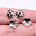 Lot de quatre calottes de perles en forme de fleur argent antique pour bijoux DIY - Argent antique