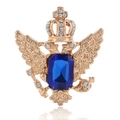 Vintage goldene Doppeladler-Brosche mit Krone und großem blauem Edelstein-Zentrum - KC Gold Königsblau
