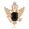 Detailansicht der Vintage-Doppeladler-Brosche mit schwarzem Edelstein und Goldauflage - KC Gold Schwarz