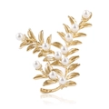 Detail of leaf-shaped gold brooch with embedded white pearls and intricate veins - Gold-White Pearl