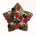 Vintage gold star brooch with colorful rhinestones and moon motif on white background - Antique Gold Multi-color