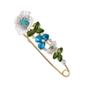 Dettaglio di spilla floreale cloisonné con petali in smalto blu e strass brillanti - Blu