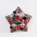 Vintage star and moon brooch in silver finish with red, green and white rhinestones - Antique Silver Colorful