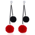 Detail of red and black plush pompom drop earrings with elegant metal chains and crystals - Black and Red