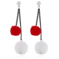 Detail of long drop earrings with red and white fur pom-poms and cubic zirconia - Red & White