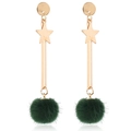 Close-up of golden star drop earrings with decorative dark green faux fur pom poms - Green