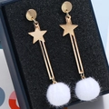 Detailed close-up of sweet cat ear drop earrings with star accent and white mink fur pom - White