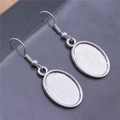 Silver oval cabochon earring settings with matte texture and classic ear hooks - 13x18mm / Antique Silver