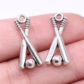 Antique silver baseball and crossed bats charms for jewelry making and DIY projects - Antique Silver