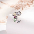 Silver bow ear cuff featuring a light green heart gemstone and multi-color zircon accents - Stainless Steel External Spiral / Mint Green Moon