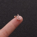 Macro view of leaf-shaped rose gold stud earring with marquise zirconia and screw back - Radial Leaf Shape (1#)