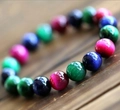 Buntes Tigerauge-Armband mit runden Natursteinperlen und Katzenaugeneffekt für Damen und Herren - Buntes Tigerauge