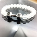 Macro shot of white matte beads and silver dumbbell charm with Fit Life engraving - Matte White/Silver