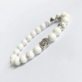 White turquoise Buddha head bracelet with natural grey marble textures on white surface - White Turquoise