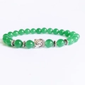 Zen style beaded bracelet with green jade-like stones and a silver Buddha head charm - Aventurine Jade